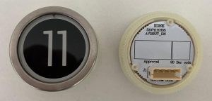 Кнопка приказа круглая, черная поверхность, белая надпись, "11" AVDBUT, KONE