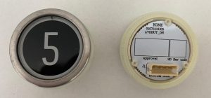 Кнопка приказа круглая, черная поверхность, белая надпись, "5" AVDBUT, KONE